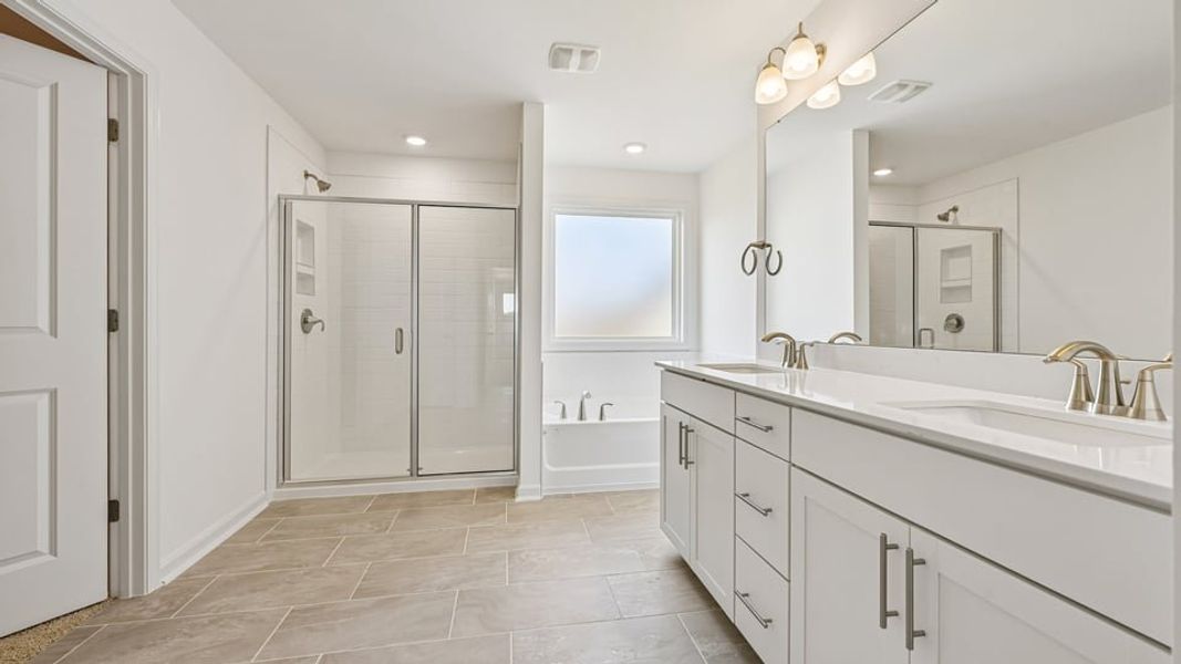 Furnished interior view inside a new home in Eagle Creek, Fuquay Varina (Image 8).