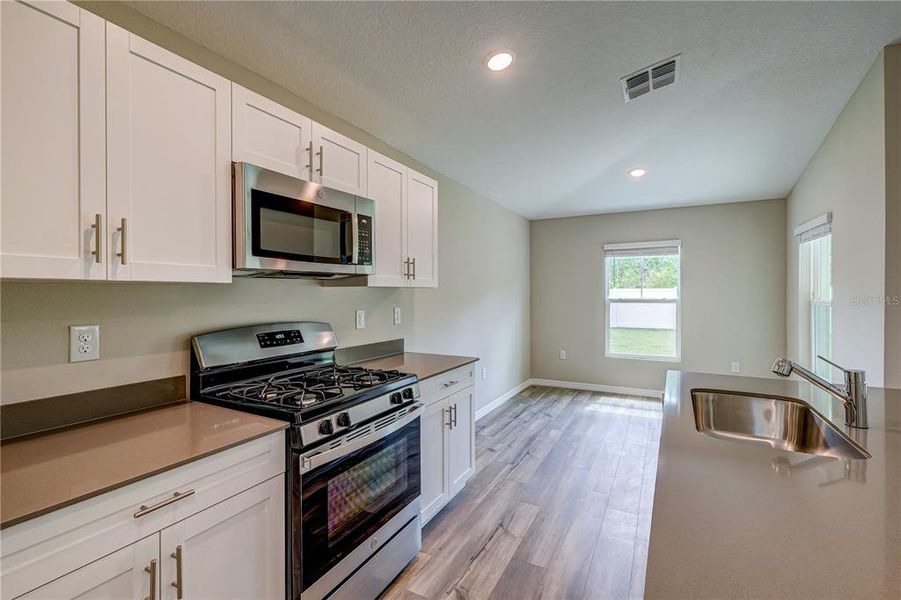 Furnished interior view inside a new home in Crosswind Point, Parrish (Image 8).