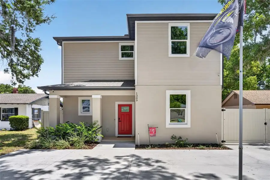 Front exterior of a new home in , Eustis, FL, highlighting curb appeal (Image 2). Front exterior of a new home in , Eustis, FL, highlighting curb appeal (Image 2).