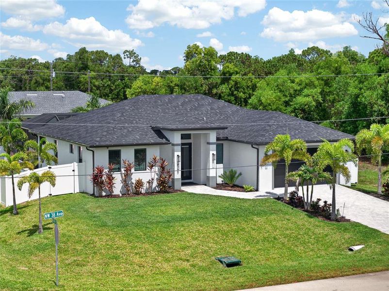 Front exterior of a new home in , Cape Coral, FL, highlighting curb appeal (Image 24).