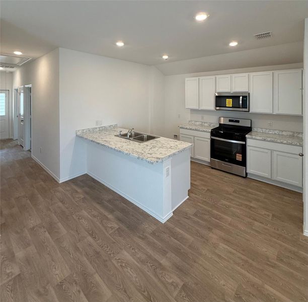 Furnished interior view inside a new home in Valverde, Bastrop (Image 4).
