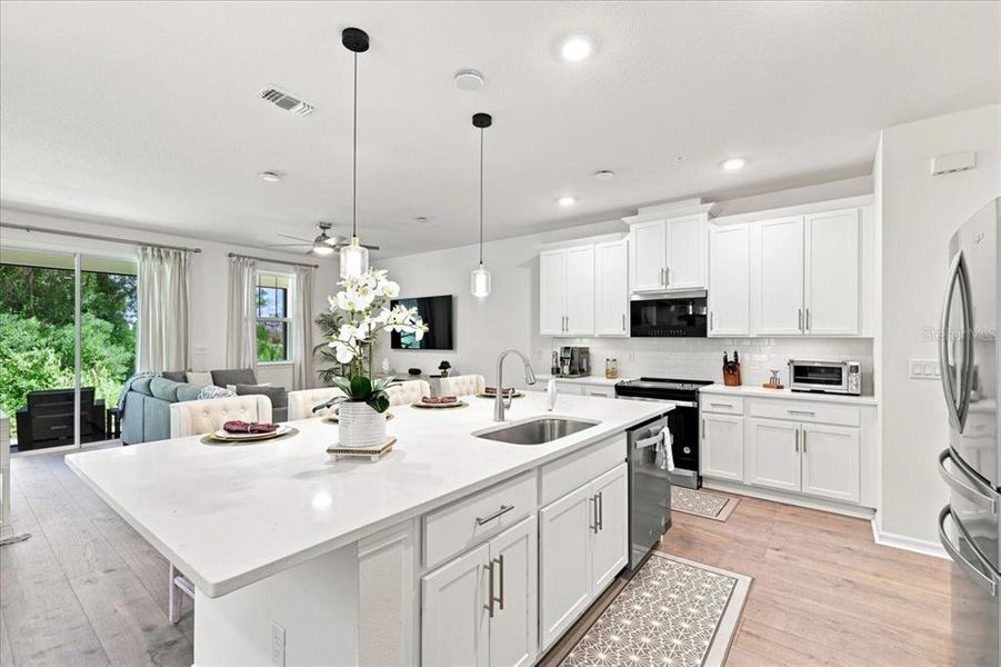 Furnished interior view inside a new home in Towns at Riverwalk, Sanford (Image 9). Furnished interior view inside a new home in Towns at Riverwalk, Sanford (Image 9).