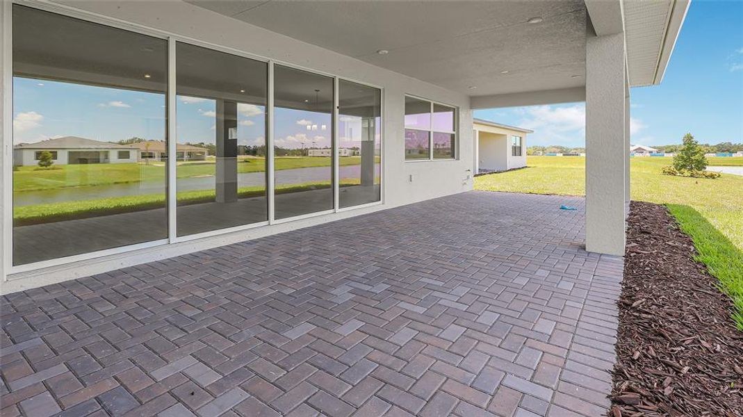 Exterior details and patio area of a home in Woodland Preserve, Parrish (Image 27).