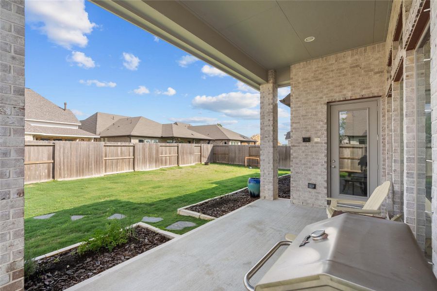 Exterior details and patio area of a home in Riceland, Mont Belvieu (Image 4).