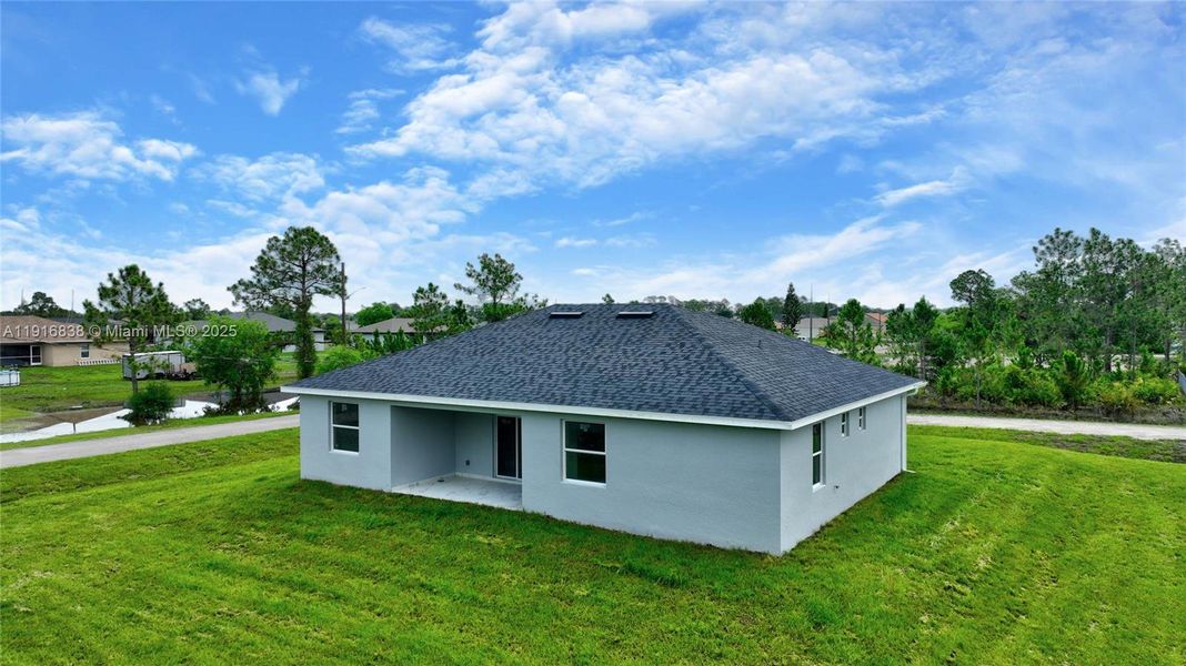 Exterior details and patio area of a home in , Lehigh Acres (Image 3). Exterior details and patio area of a home in , Lehigh Acres (Image 3).