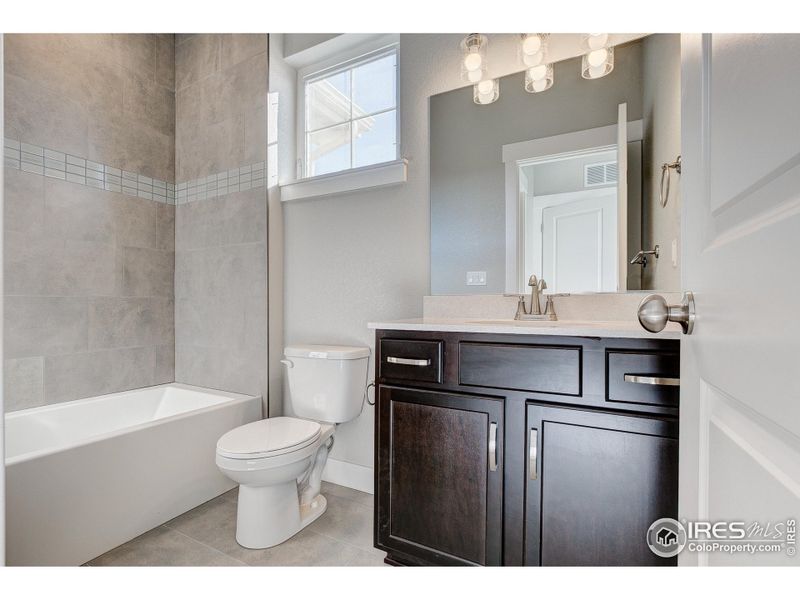 Furnished interior view inside a new home in The Lakes at Centerra - The Shores, Loveland (Image 12).