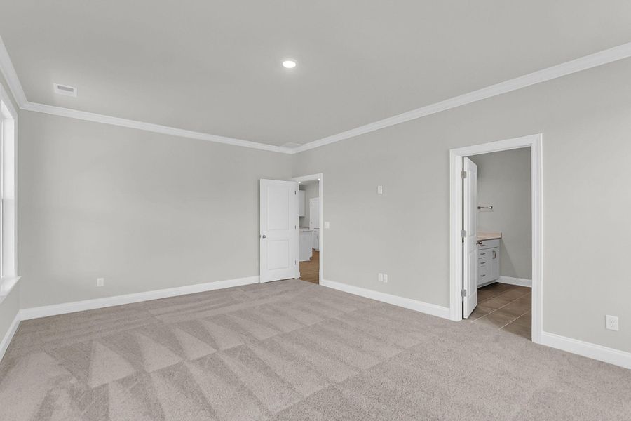 Spacious, unfurnished interior of a new home in Tidewater at Lakes of Cane Bay, Summerville (Image 30). Spacious, unfurnished interior of a new home in Tidewater at Lakes of Cane Bay, Summerville (Image 30).