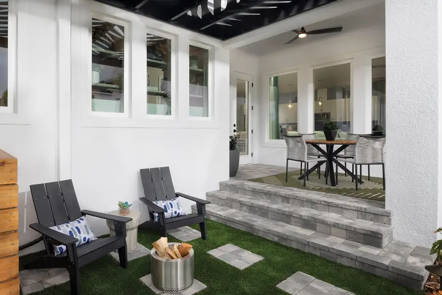 Exterior details and patio area of a home in Emerald Landing at Waterside at Lakewood Ranch – Cottage Series, Sarasota (Image 3). Exterior details and patio area of a home in Emerald Landing at Waterside at Lakewood Ranch – Cottage Series, Sarasota (Image 3).
