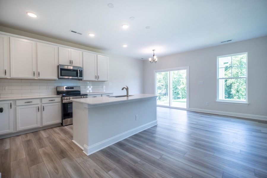 Furnished interior view inside a new home in Cottages at Piper Village, Trinity (Image 6). Furnished interior view inside a new home in Cottages at Piper Village, Trinity (Image 6).
