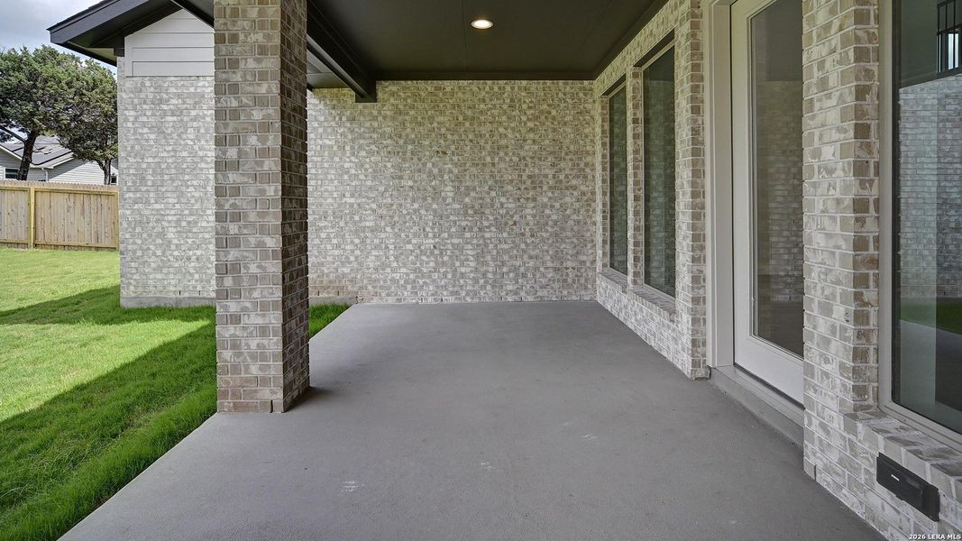 Exterior details and patio area of a home in Kallison Ranch, San Antonio (Image 25).
