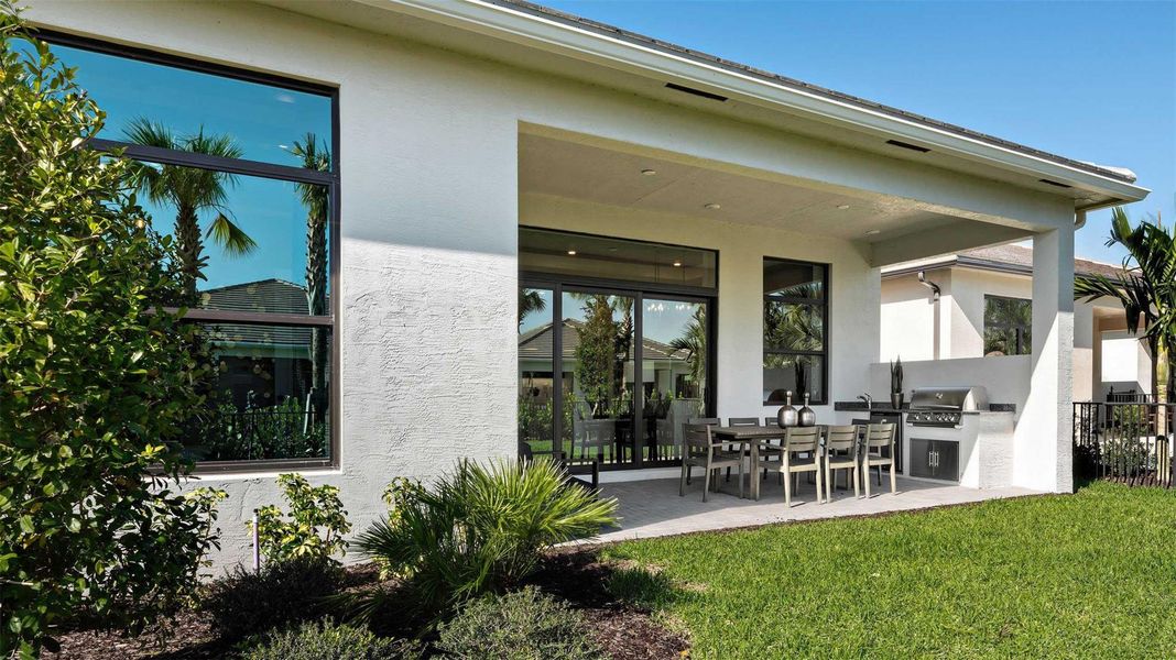 Exterior details and patio area of a home in Cresswind Palm Beach at Westlake, Westlake (Image 3).