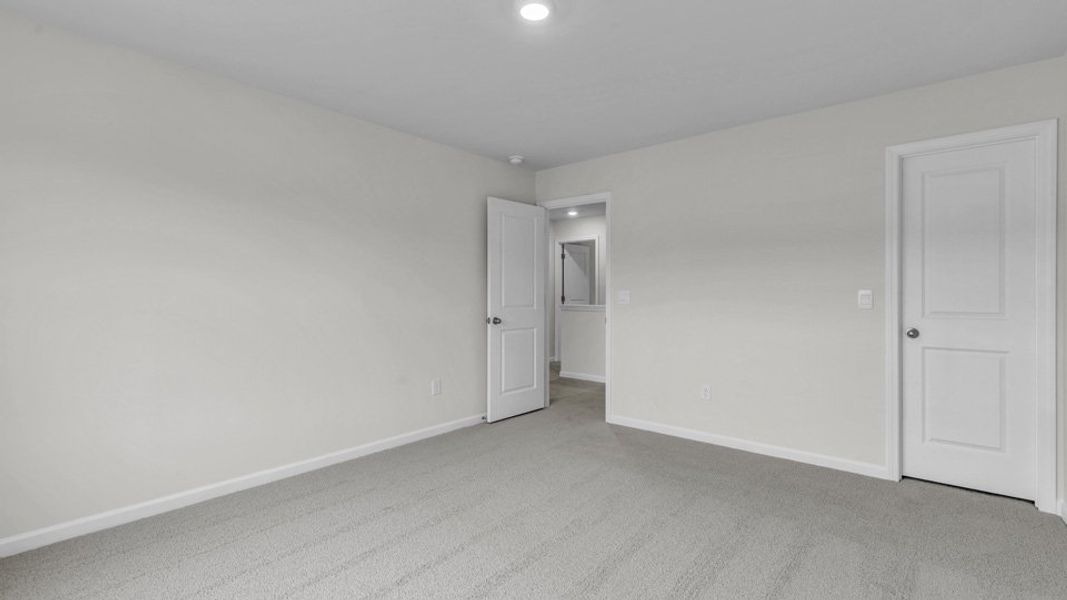 Representative unfurnished interior of a home built from the WILMINGTON by D.R. Horton in North Gate, Vass (Image 28).