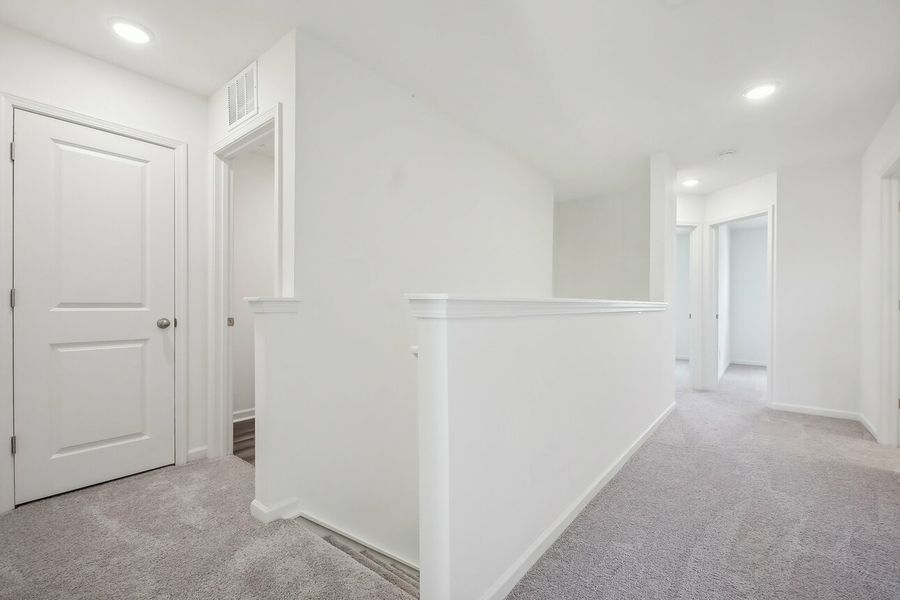 Furnished interior in a model home at Walker Station in Wilson (Image 9).