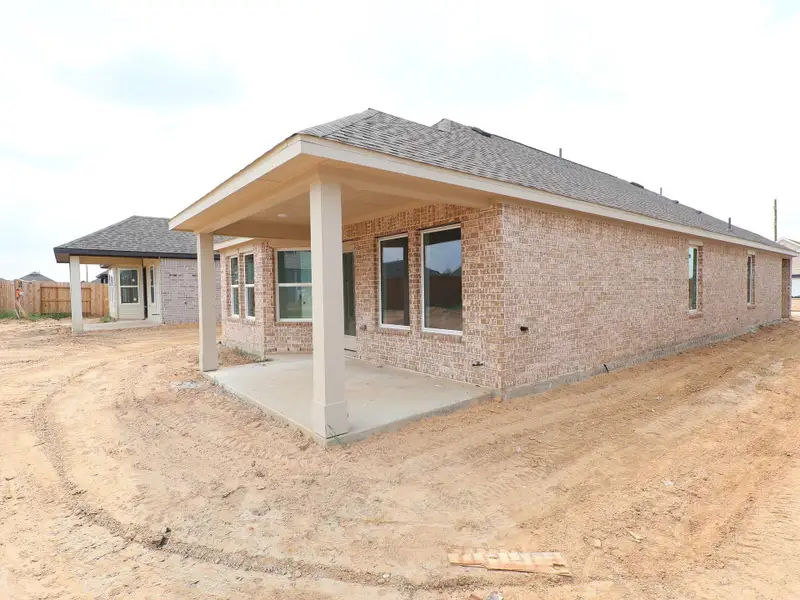 Front exterior of a new home in Marvida, Cypress, TX, highlighting curb appeal (Image 1). Front exterior of a new home in Marvida, Cypress, TX, highlighting curb appeal (Image 1).