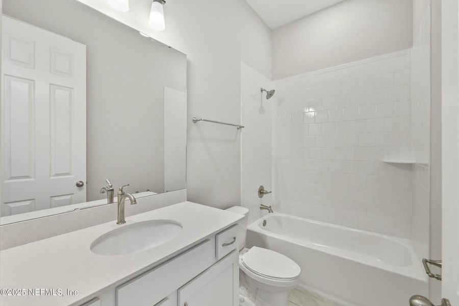 Furnished interior view inside a new home in Silver Landing at SilverLeaf, St. Augustine (Image 40).