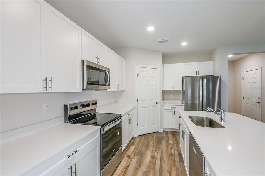 Furnished interior view inside a new home in Pasadena Woods, Dade City (Image 5).