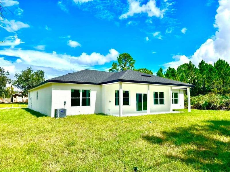 Exterior details and patio area of a home in , Palm Bay (Image 4).