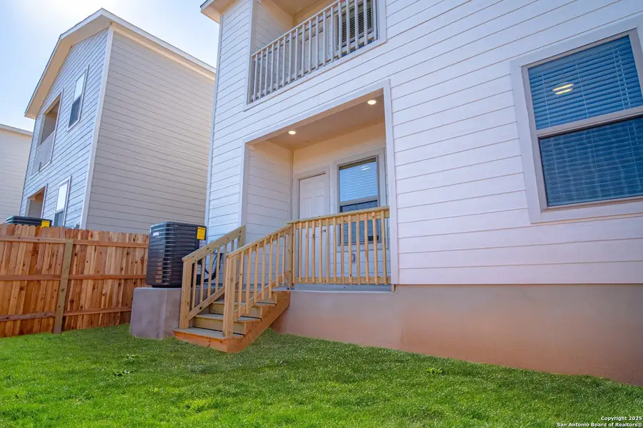 Exterior details and patio area of a home in Magnolia Village North, San Antonio (Image 31).