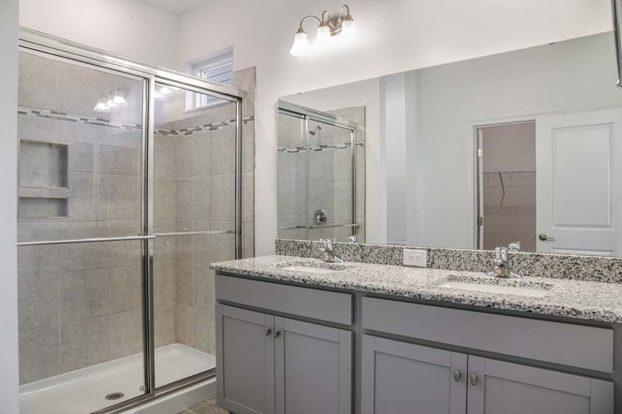 Representative furnished interior of a home built from the Flora by William Ryan Homes in The Sanctuary – Coastal Collection, Punta Gorda (Image 14). Representative furnished interior of a home built from the Flora by William Ryan Homes in The Sanctuary – Coastal Collection, Punta Gorda (Image 14).