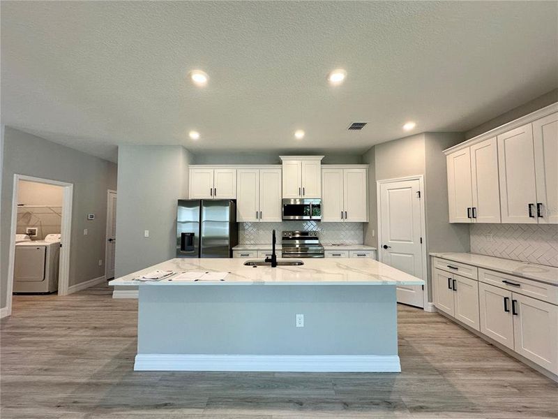 Furnished interior view inside a new home in , Ocala (Image 9).