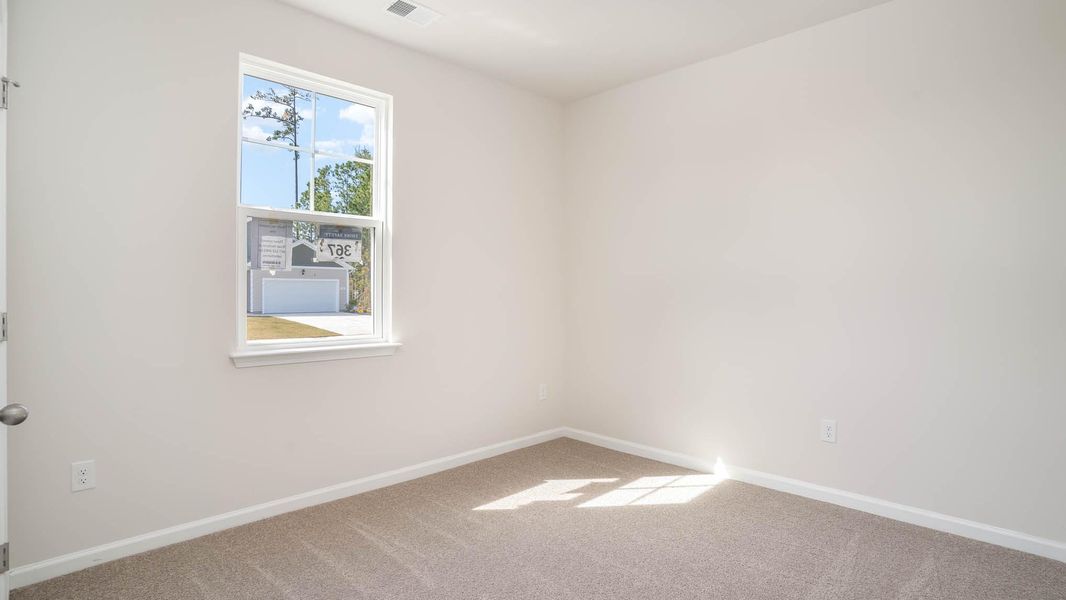Representative unfurnished interior of a home built from the KERRY by D.R. Horton in Sandridge Park, Little River (Image 10).