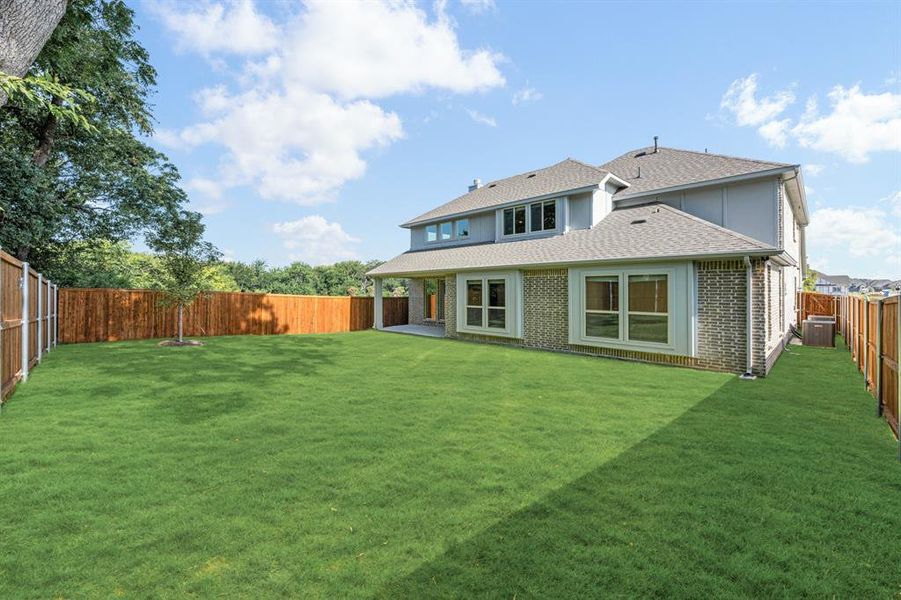Exterior details and patio area of a home in Liberty, Melissa (Image 3). Exterior details and patio area of a home in Liberty, Melissa (Image 3).