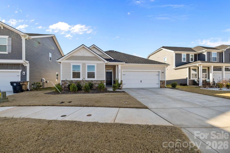 Front exterior of a new home in Sheffield, Indian Trail, NC, highlighting curb appeal (Image 26).
