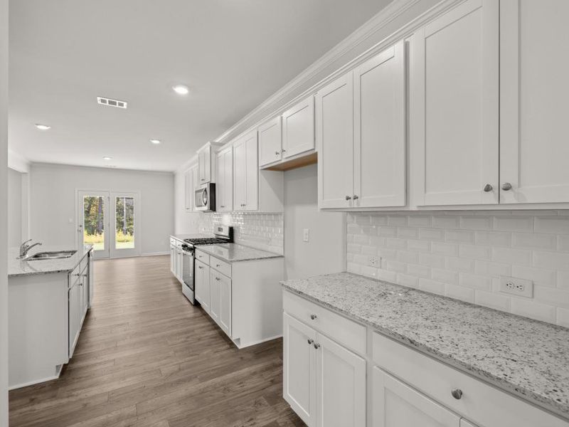 Furnished interior view inside a new home in Parkside at Carter Grove, Cartersville (Image 6).