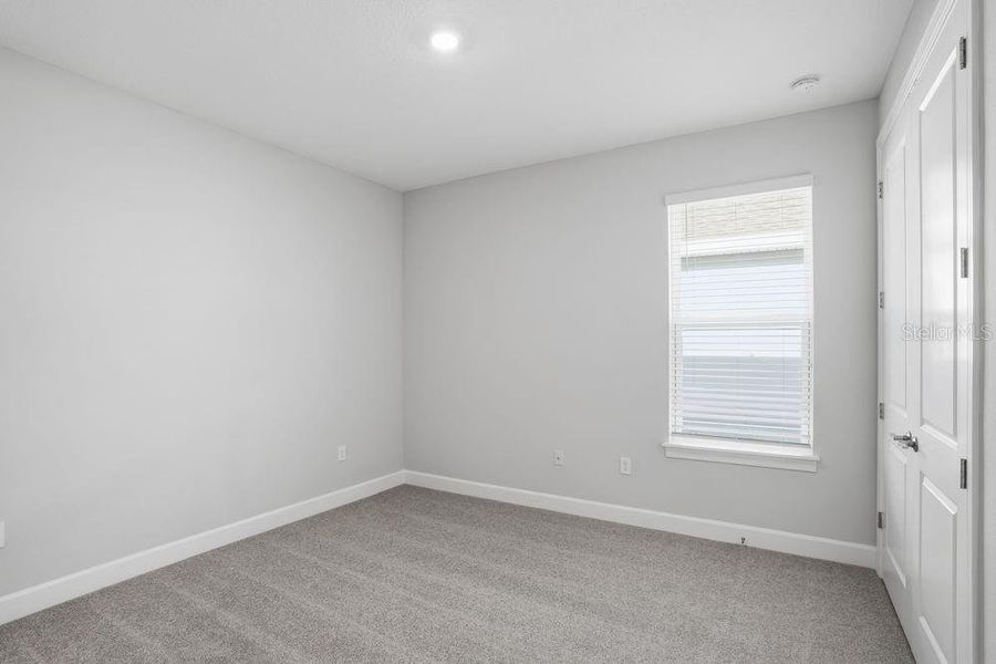 Spacious, unfurnished interior of a new home in Esplanade at Center Lake Ranch, St. Cloud (Image 24).