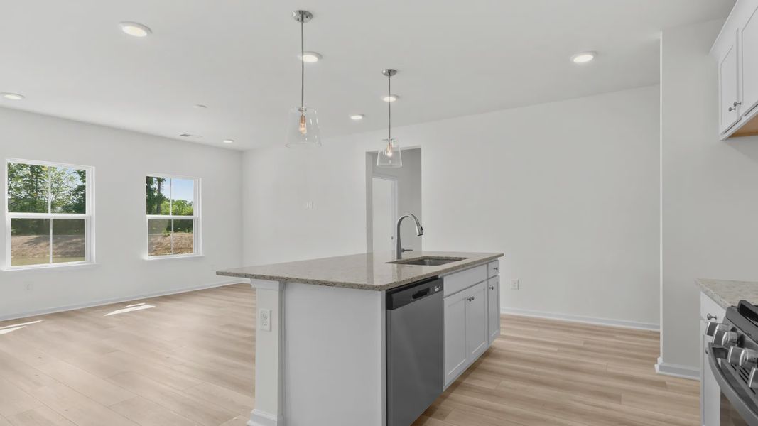 Furnished interior view inside a new home in Bluffs at Sun Colony, Longs (Image 9).