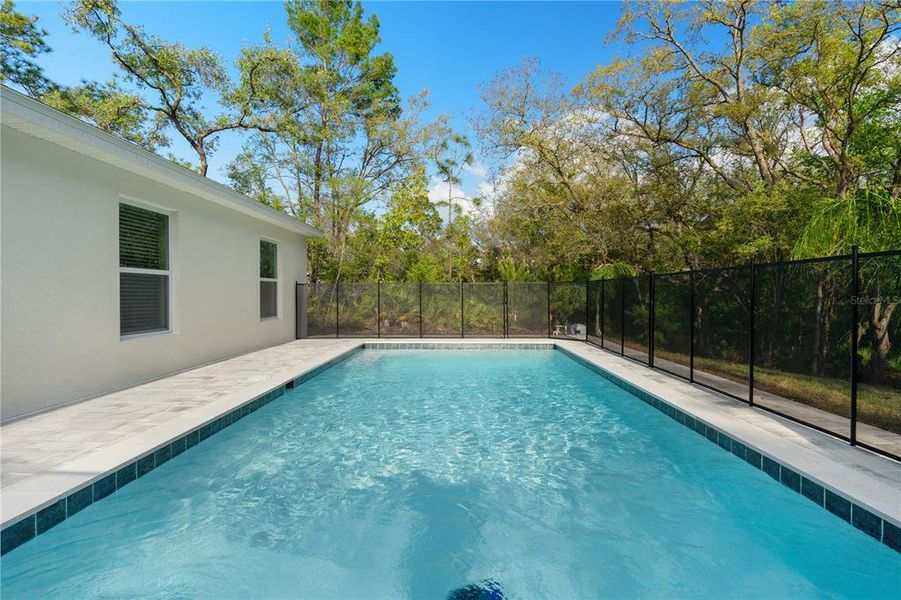 Exterior details and patio area of a home in , Weeki Wachee (Image 30).