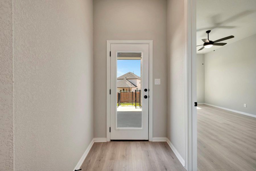 Spacious, unfurnished interior of a new home in Heritage, Dripping Springs (Image 37).