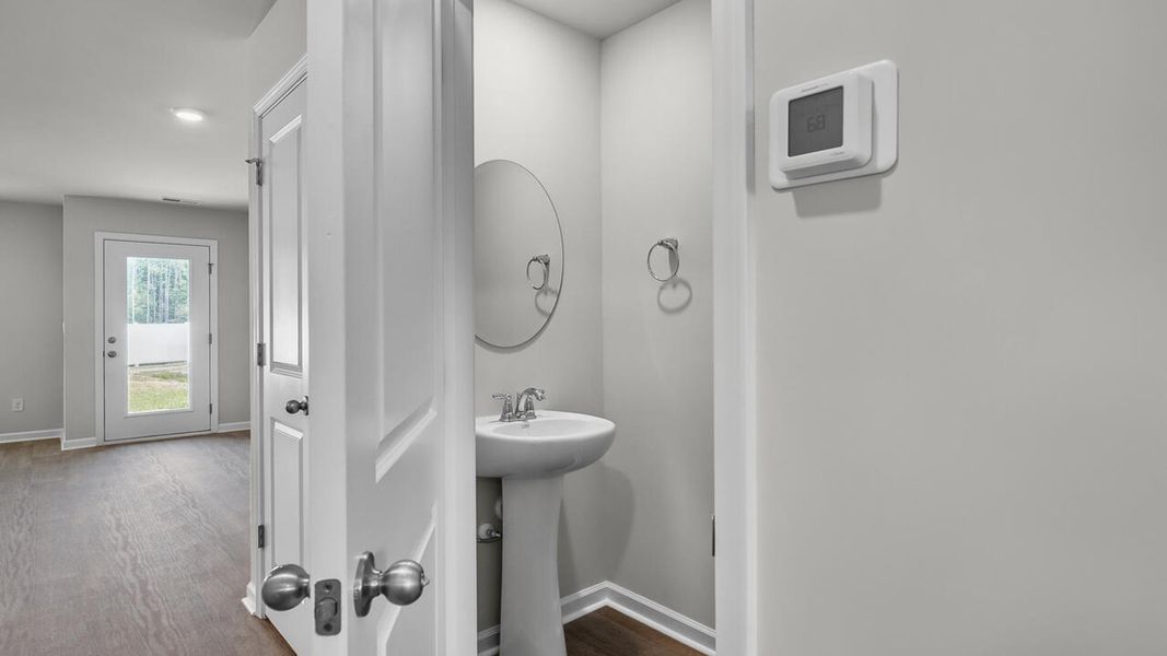 Furnished interior view inside a new home in Grayson Park Duets, Leland (Image 9).