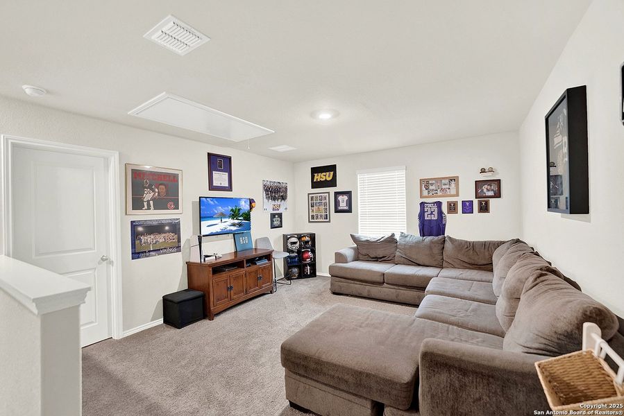 Furnished interior view inside a new home in The Links at River Bend, Floresville (Image 9).