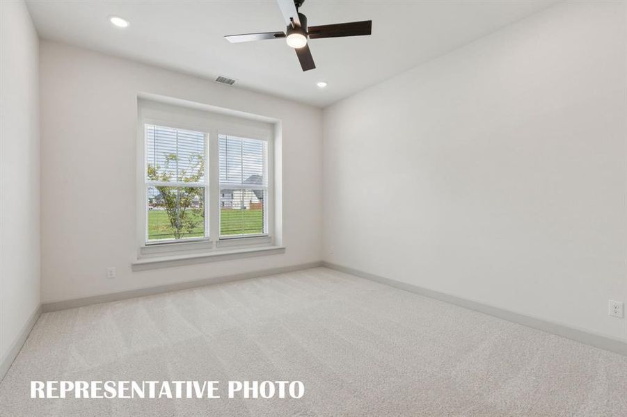 Peaceful and relaxing, this owner's suite is the perfect place to rest and renew at the end of the day.  REPRESENTATIVE PHOTO