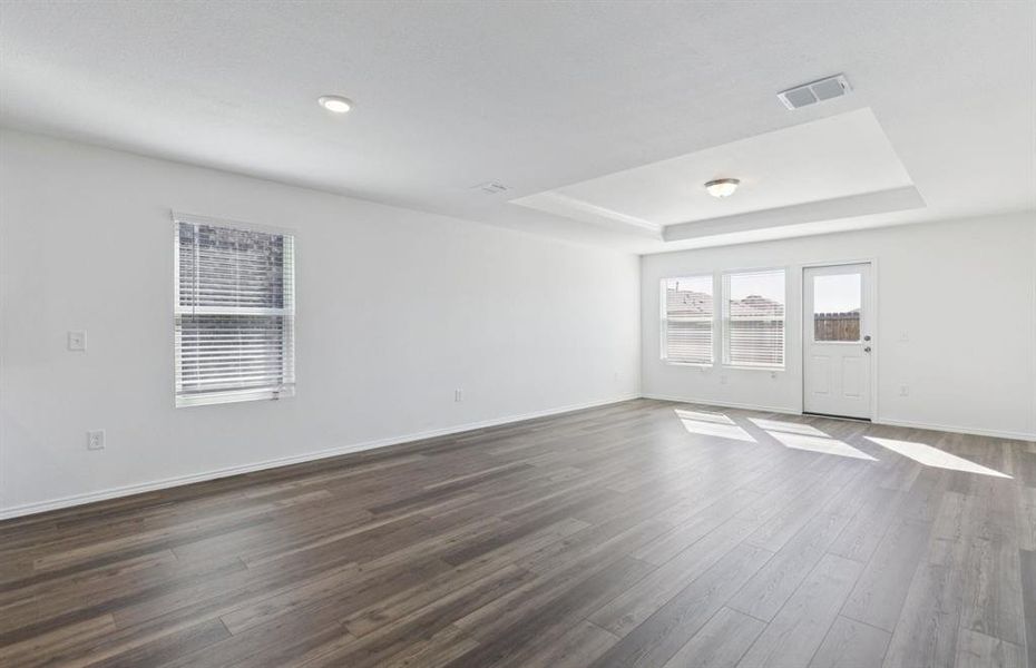 Sunlit gathering room designed for relaxation and entertainment Sunlit gathering room designed for relaxation and entertainment