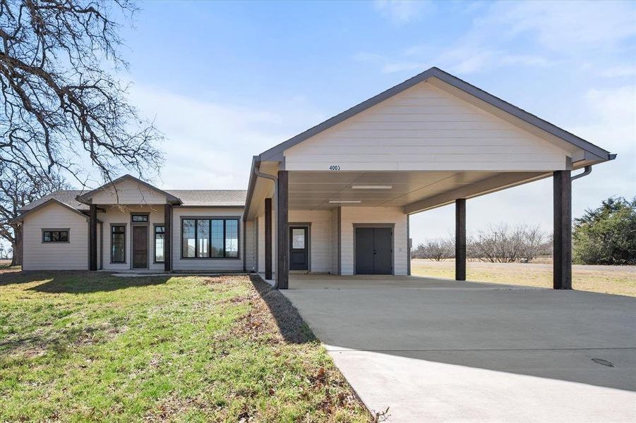 Front exterior of a new home in , Streetman, TX, highlighting curb appeal (Image 1). Front exterior of a new home in , Streetman, TX, highlighting curb appeal (Image 1).