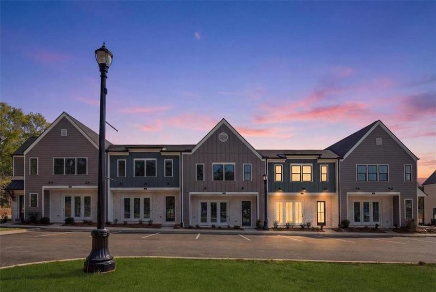 Front exterior of a new home in Laurel Park, Braselton, GA, highlighting curb appeal (Image 26). Front exterior of a new home in Laurel Park, Braselton, GA, highlighting curb appeal (Image 26).