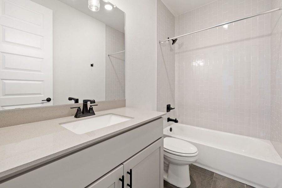 Furnished interior view inside a new home in Lagos Reserve, Manor (Image 17).