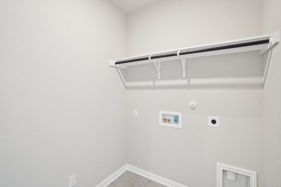 Laundry room in a Rio Grande floorplan at a Meritage Homes community. Laundry room in a Rio Grande floorplan at a Meritage Homes community.