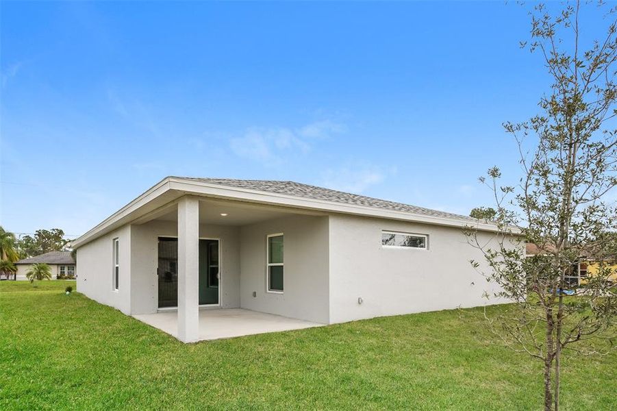 Exterior details and patio area of a home in , North Port (Image 2).