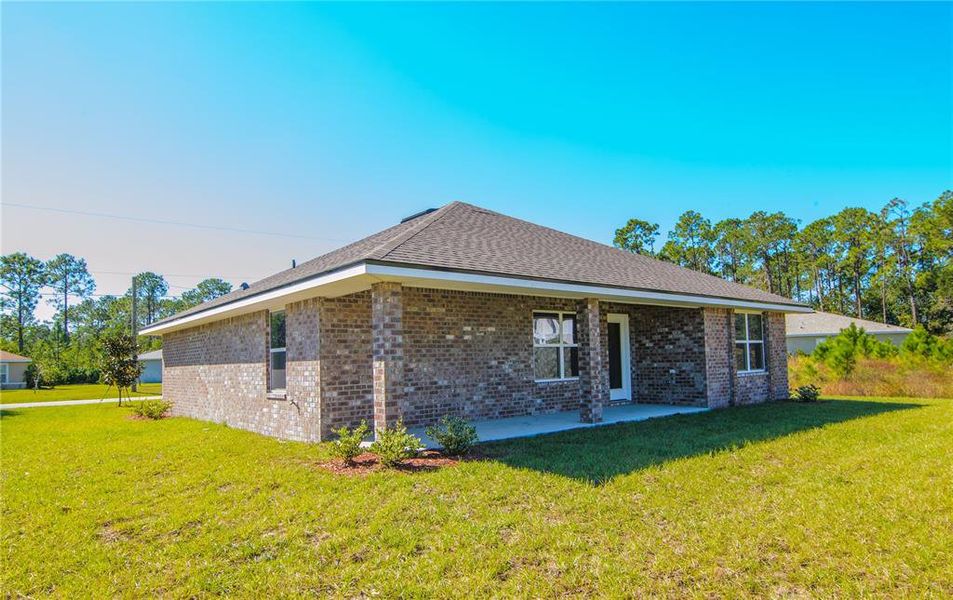 Exterior details and patio area of a home in Palm Coast, Palm Coast (Image 21).