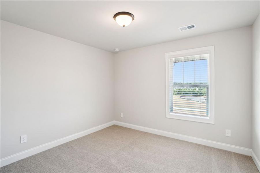 Spacious, unfurnished interior of a new home in Hemingway - Highland Series, Cumming (Image 34).