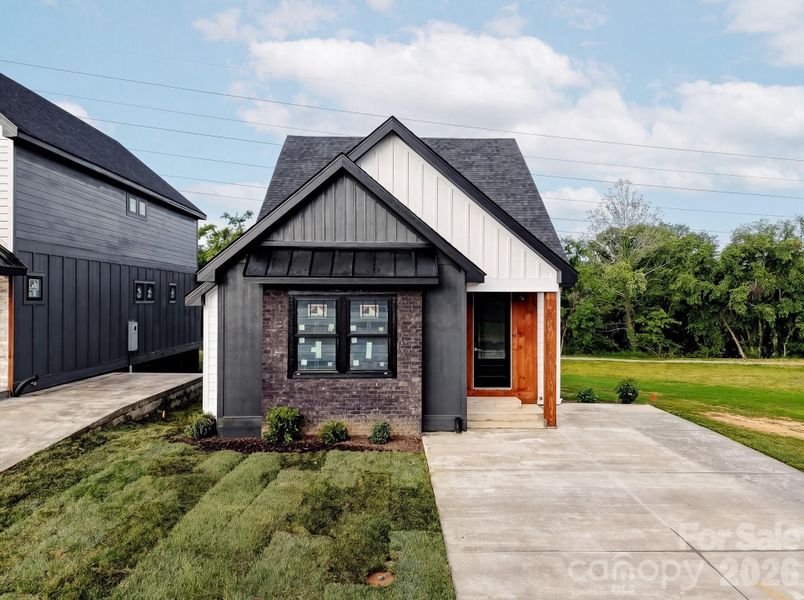 Front exterior of a new home in , Hendersonville, NC, highlighting curb appeal (Image 11). Front exterior of a new home in , Hendersonville, NC, highlighting curb appeal (Image 11).
