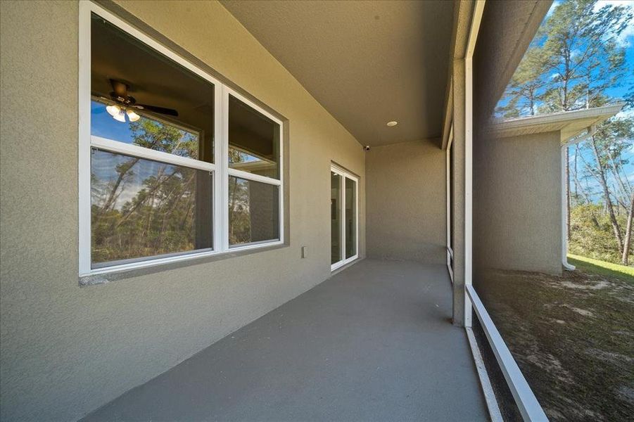 Exterior details and patio area of a home in , Ocala (Image 25).