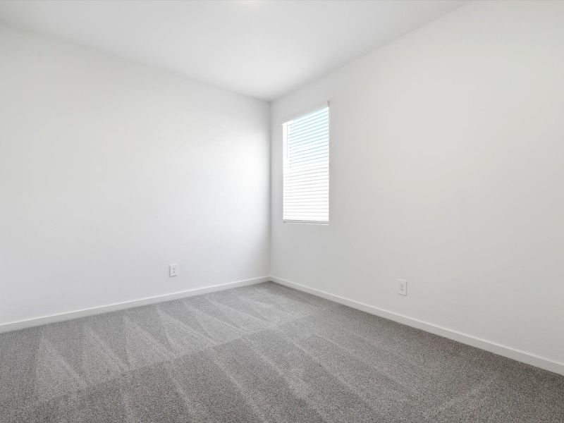 Spacious, unfurnished interior of a new home in Wildera, San Tan Valley (Image 11).