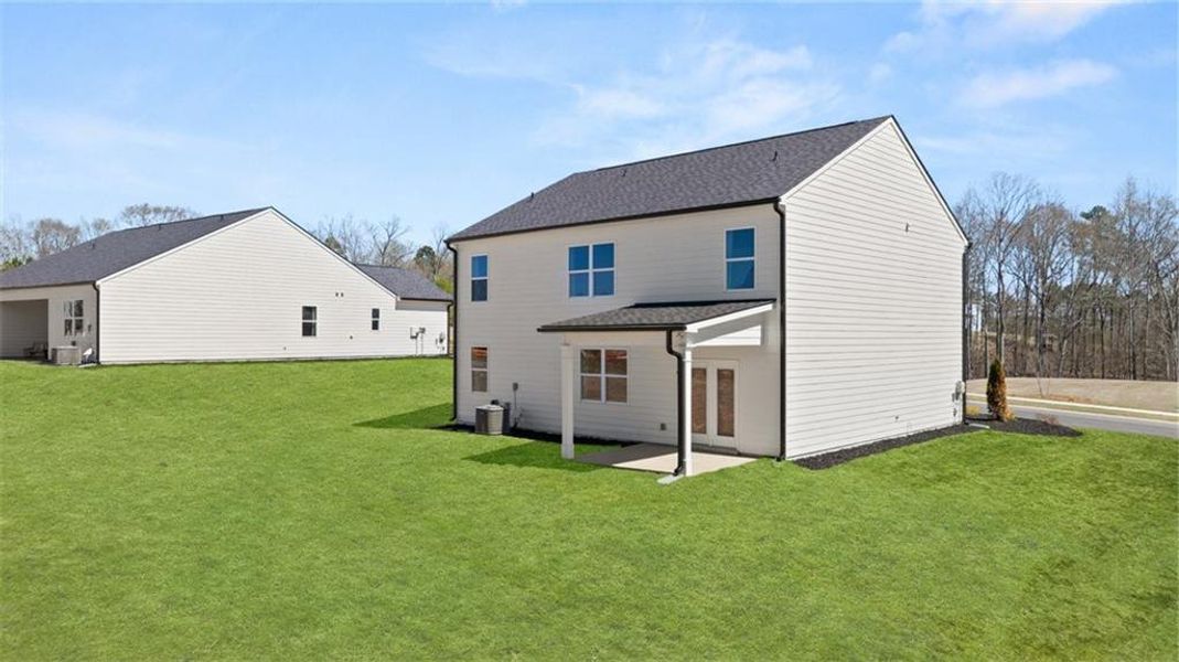 Exterior details and patio area of a home in Kingston Ranch at Lake Oconee, Buckhead (Image 2).