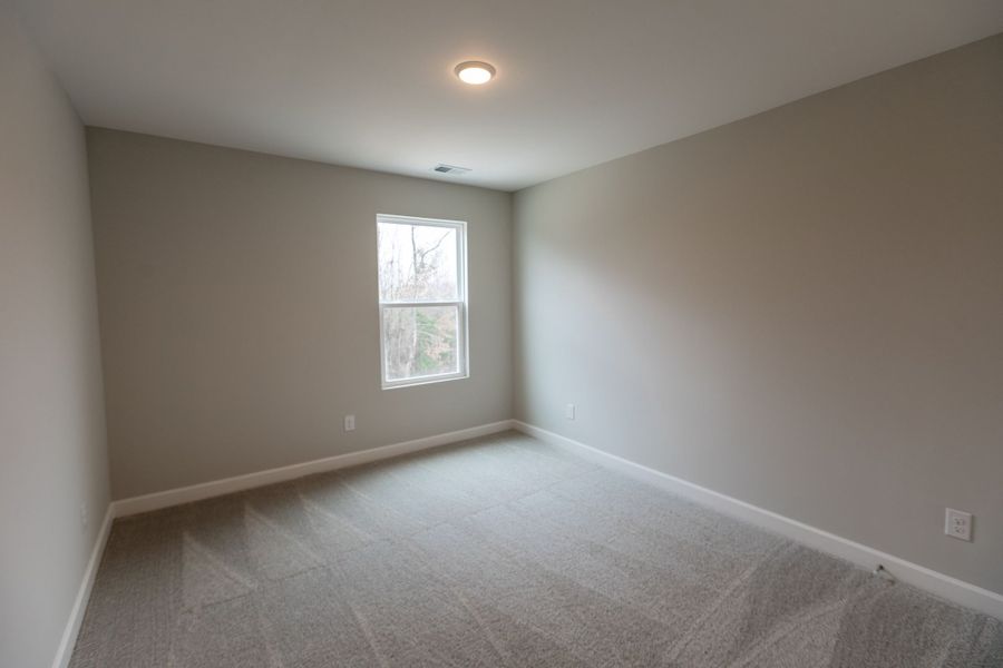 Representative unfurnished interior of a home built from the Dalton by Parkside Builders in The Woods, Gallatin (Image 20).