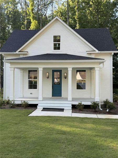 Front exterior of a new home in , Bowdon, GA, highlighting curb appeal (Image 1). Front exterior of a new home in , Bowdon, GA, highlighting curb appeal (Image 1).