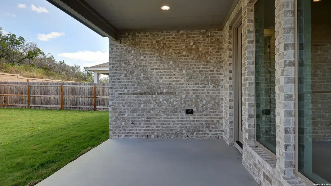 Exterior details and patio area of a home in Ladera, San Antonio (Image 4).